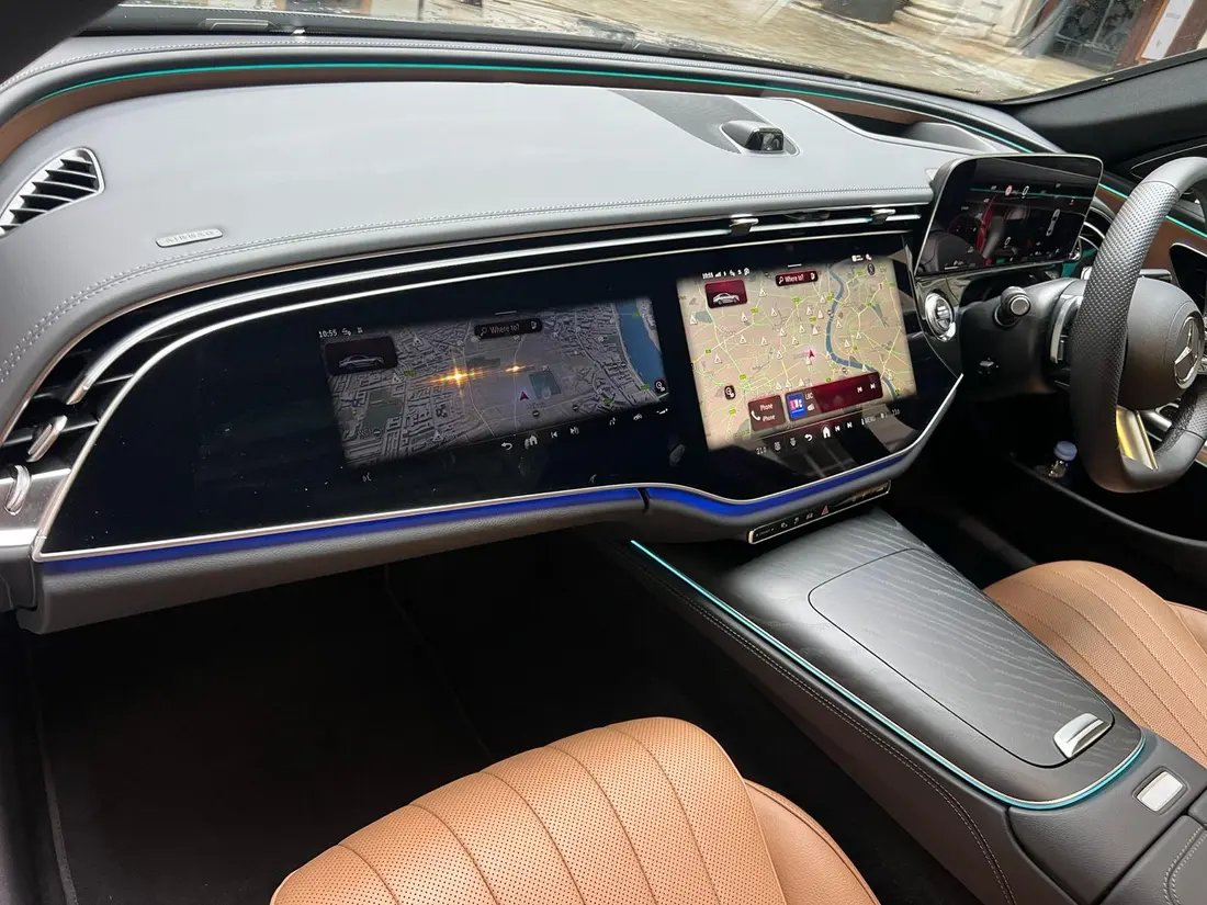 Mercedes S-Class dashboard with twin digital screens and ambient lighting